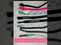 スポーツの衣類のシリコーンの端が付いている注文のドローストリングのコード